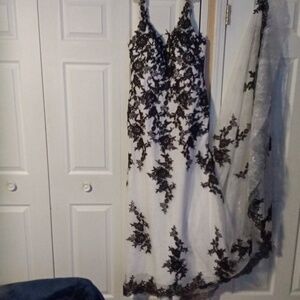 Elegant Black Lace Appliqué Wedding Dress - White with Black Detail With a Train